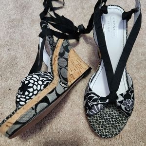 Really cute pair of vintage coach sandals with a wrap around black ribbon
